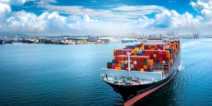 aerial-side-view-of-cargo-ship-carrying-container-and-running-for-export.jpg